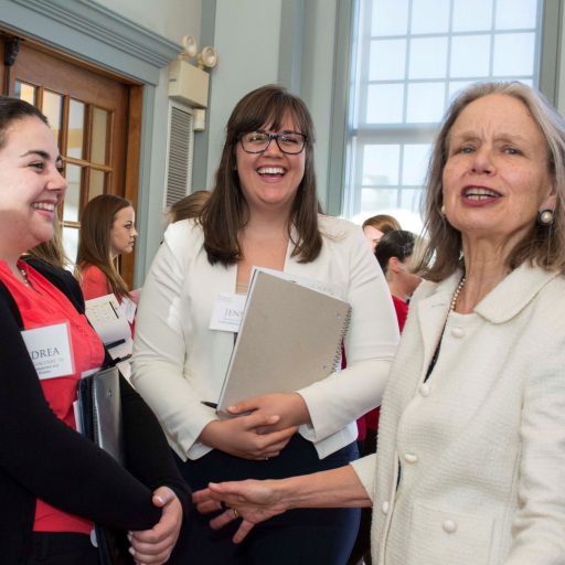 Group of female URI alums at an event