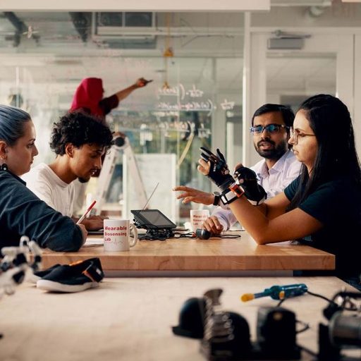 Diverse group of engineering students working in a lab