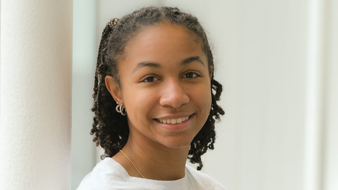 Jahnae Drummond standing by a window