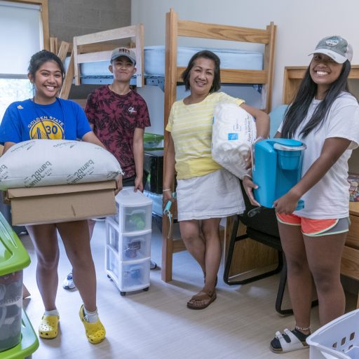 Mom and daughter moving into the dorm