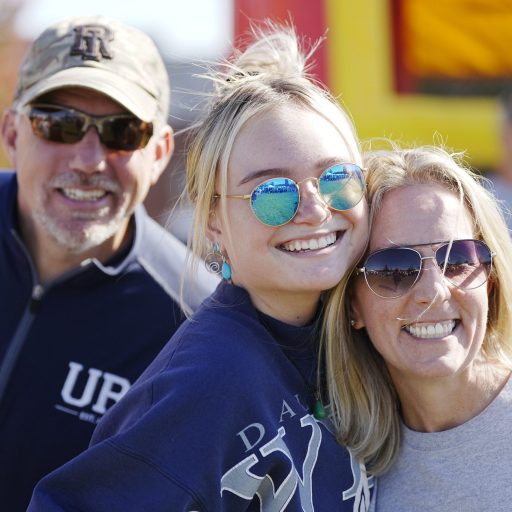 Parents and daughter at Alumni & Family Weekend