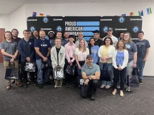 Hayward Industries gathers a group of URI alumni for a photo.
